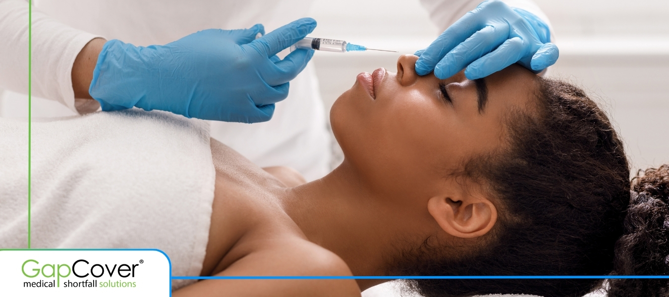 woman-receiving-cosmetic-injection-at-medical-clinic